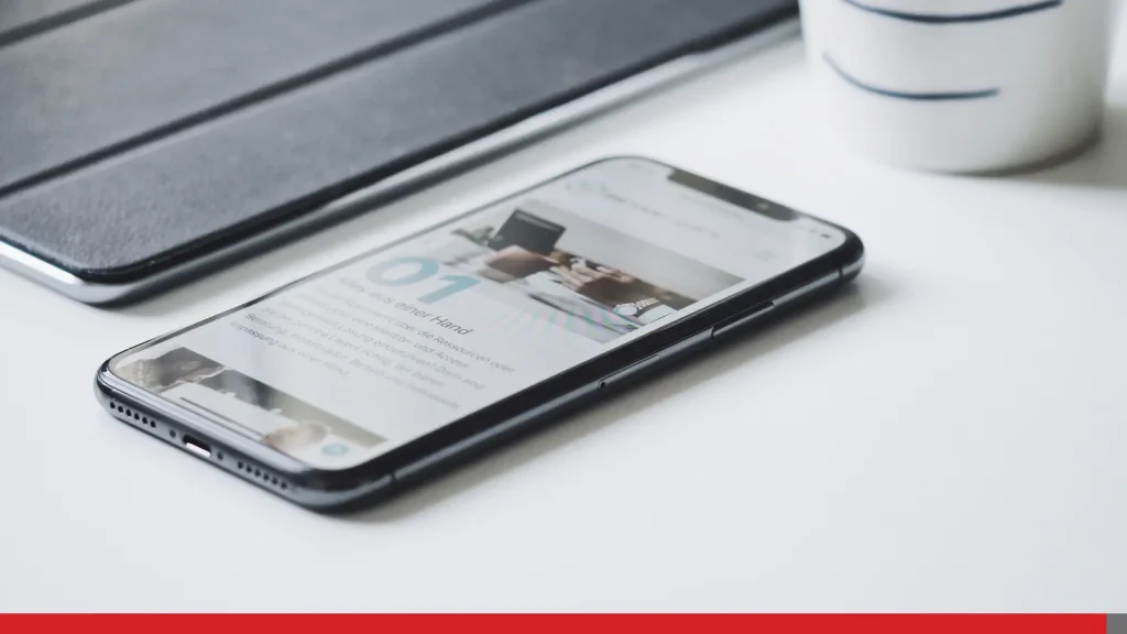 Smartphone laying on a desk.