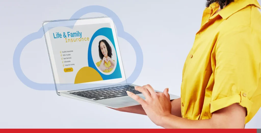 Picture of a woman holding a laptop and looking at the landing page of an insurance company.