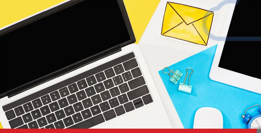 top view of digital devices with office supplies and mail icon on yellow, blue and white background