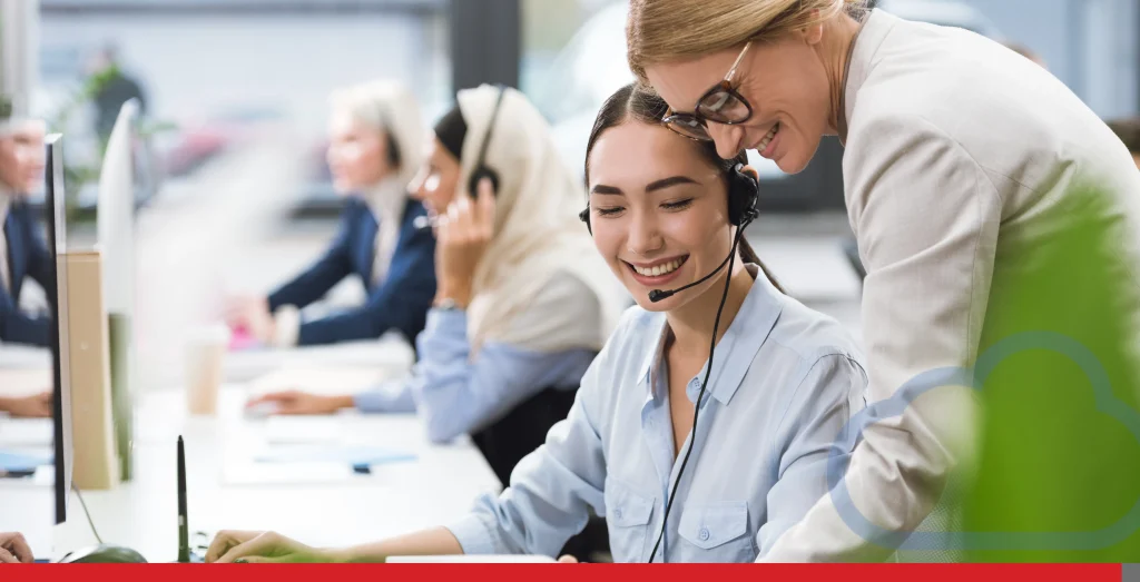 selective focus of smiling multicultural businesswomen using tablet together at workplace in office
